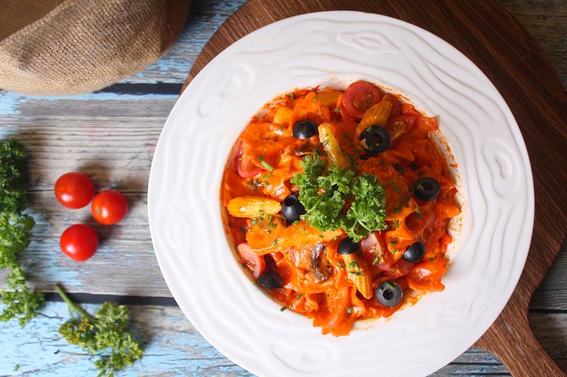 Penne Arrabbiata with spicy tomato sauce and fresh basil