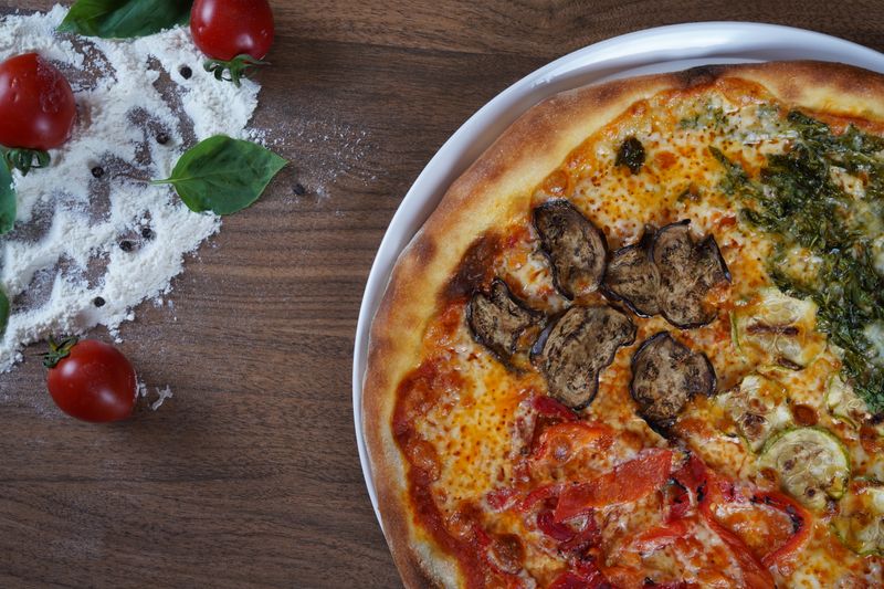 luce pizza Mediterranean vegetable pizza with olives and feta